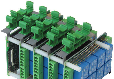DIN-RAIL Kit Type2 perpendicular mount holding multiple Raspberry Pi add-on cards with green terminal connectors.