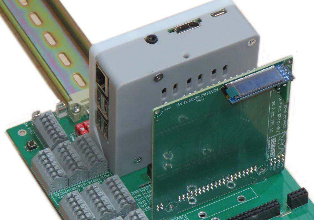 16 Analog 4–20 mA output card, green circuit board with gray terminal blocks and a small OLED display