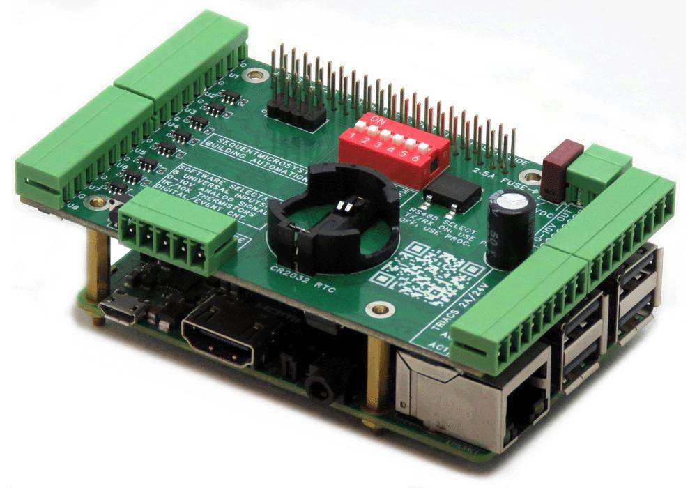 Building Automation HAT with a green circuit board, pluggable terminal blocks, red DIP switch, and coin-cell battery