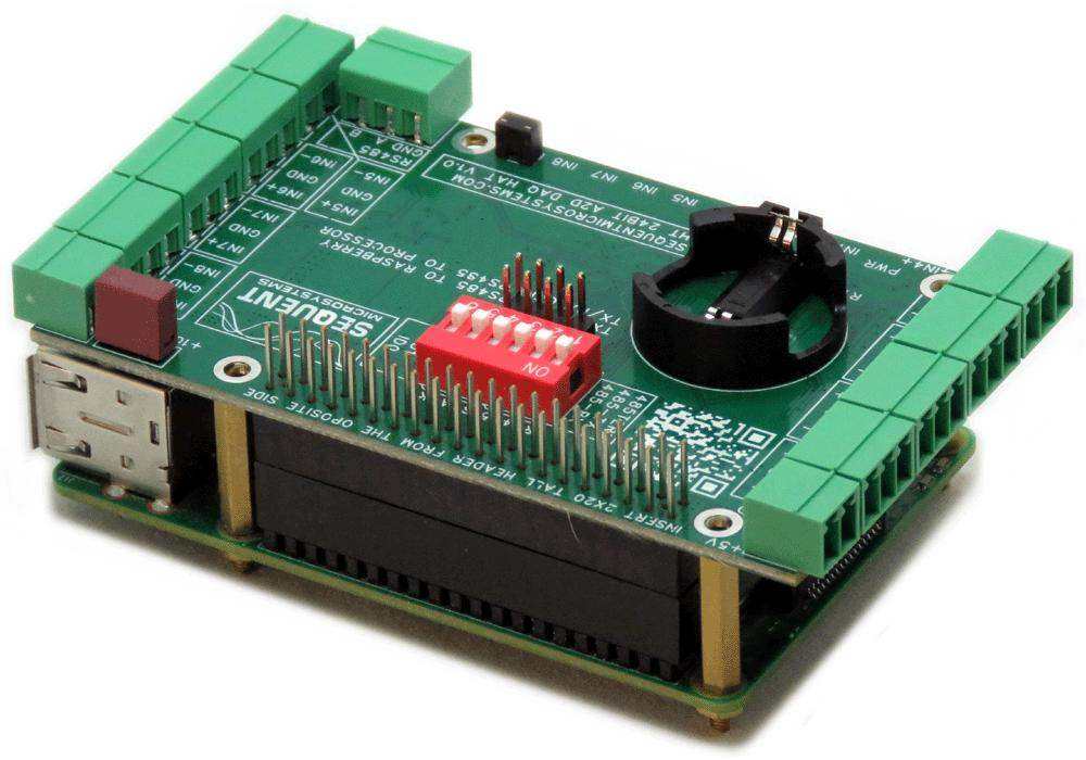 Eight 24-Bit Analog Inputs DAQ HAT with a green circuit board, green terminal blocks, red DIP switches and black battery holder