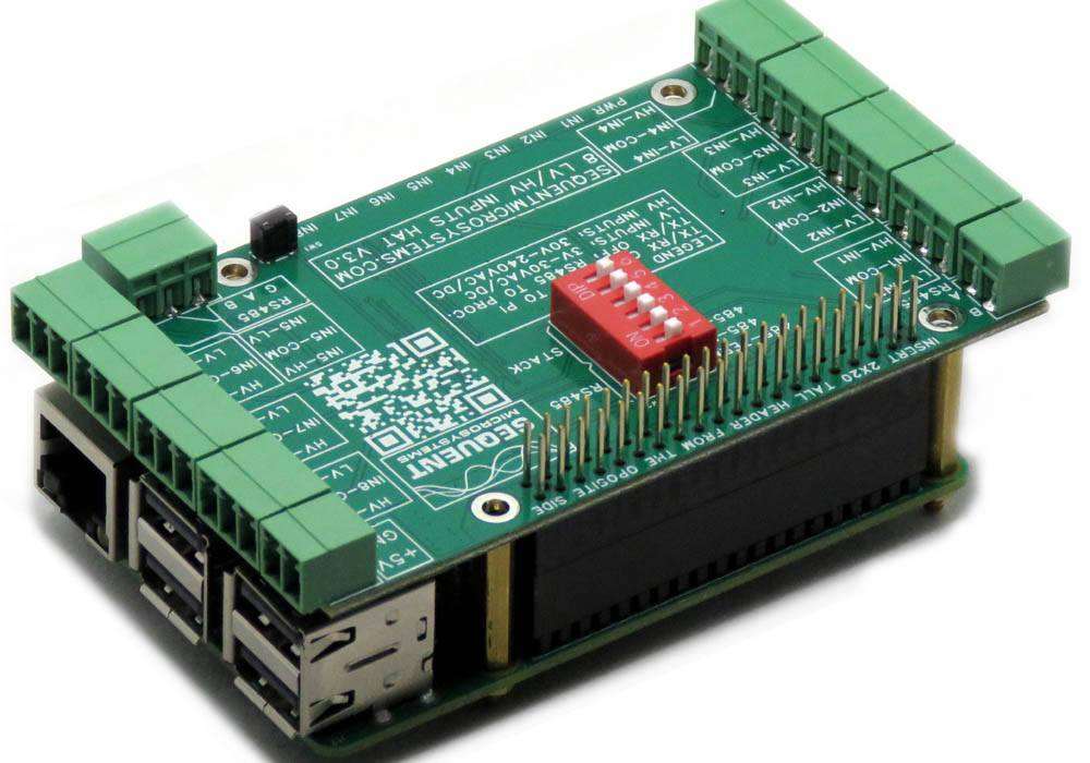 Eight HV Digital Inputs HAT with a green circuit board, green terminal blocks, red DIP switch and stacked Raspberry Pi