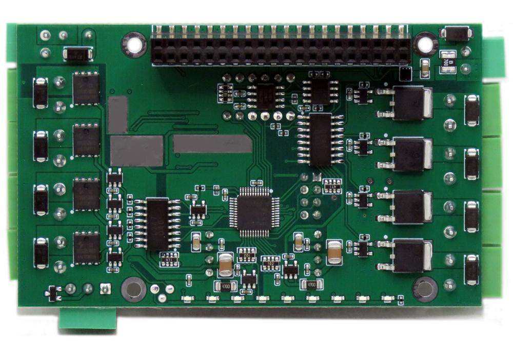 Eight MOSFETS Raspberry Pi HAT with a green PCB, black chips, pin header and rows of output components