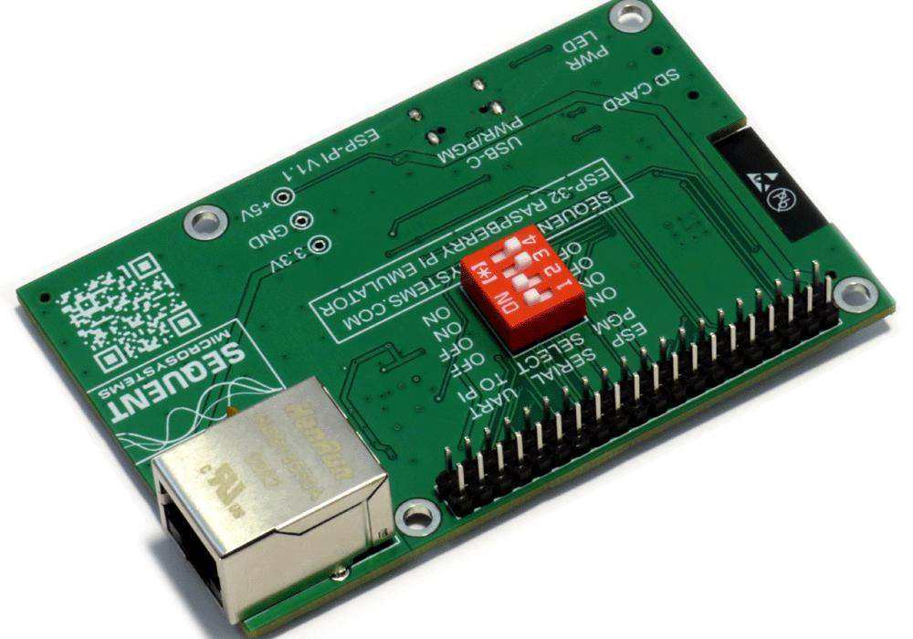 ESP32 development board with a green PCB, red DIP switch, metal Ethernet jack and dual-row GPIO header