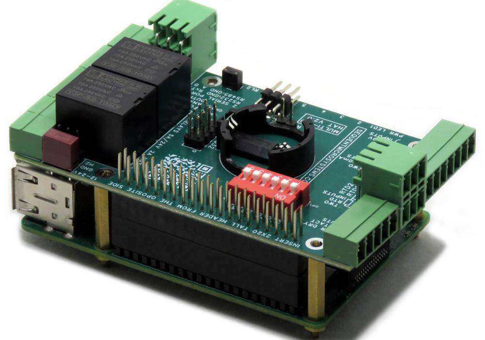 Multi-IO HAT, green circuit board with black relays, green screw terminals, a red DIP switch, and stacked Raspberry Pi