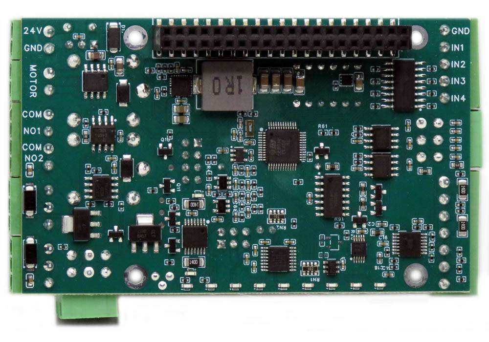 Multi-IO HAT green circuit board with black GPIO header, screw terminals, chips, and labeled I/O connections