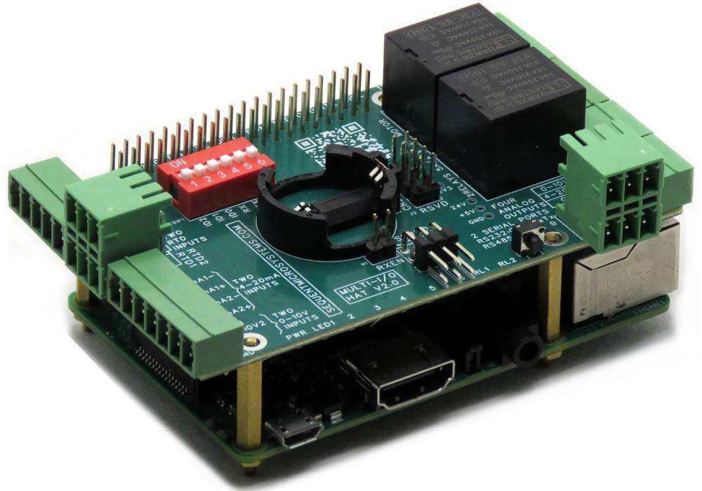 Multi-IO HAT circuit board in green with screw terminals, black relays, red DIP switches and a coin-cell holder