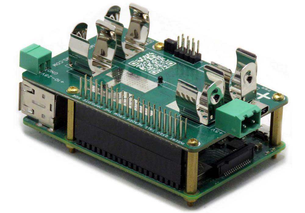 Multichemistry Watchdog HAT with a green circuit board, metal 18650 battery clips, power connectors, and GPIO header