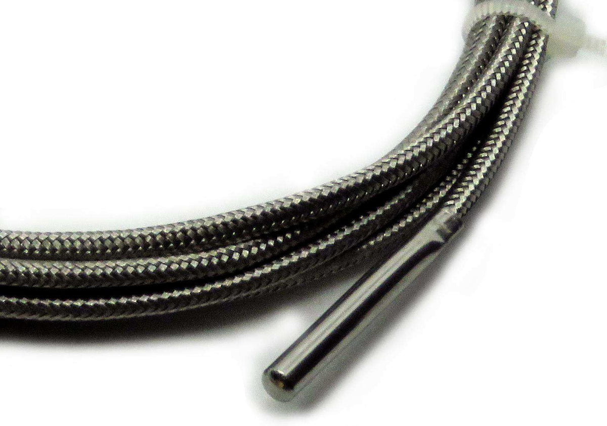 PT100 Sensor with a slim stainless steel probe and flexible black braided leads for temperature measurement