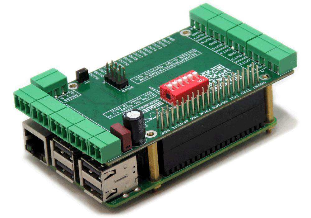 Sixteen 0-10V Analog Outputs HAT with a green circuit board, green terminal blocks, red DIP switch and GPIO header