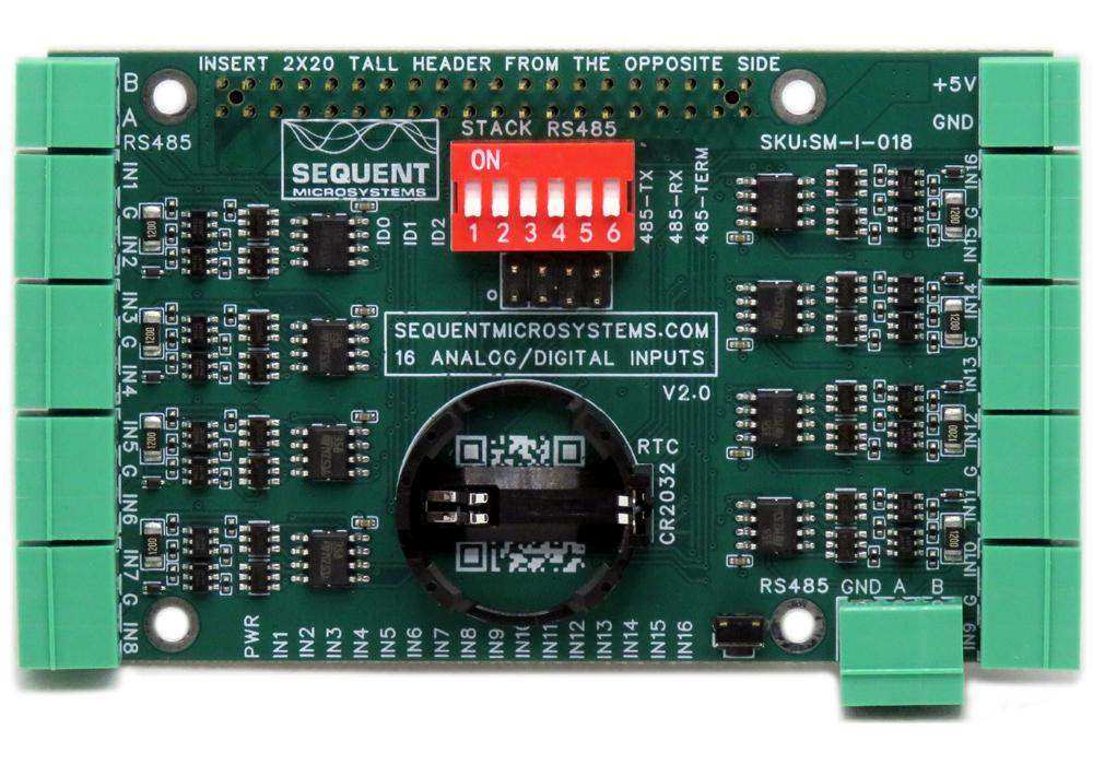 Sixteen Analog-Digital Inputs circuit board with a green PCB, pluggable green terminal blocks, red DIP switch and battery