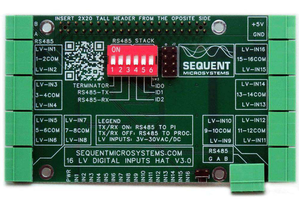 Sixteen LV Digital Inputs card with a green PCB, black silkscreen, red DIP switches, screw terminals, and labeled input channels