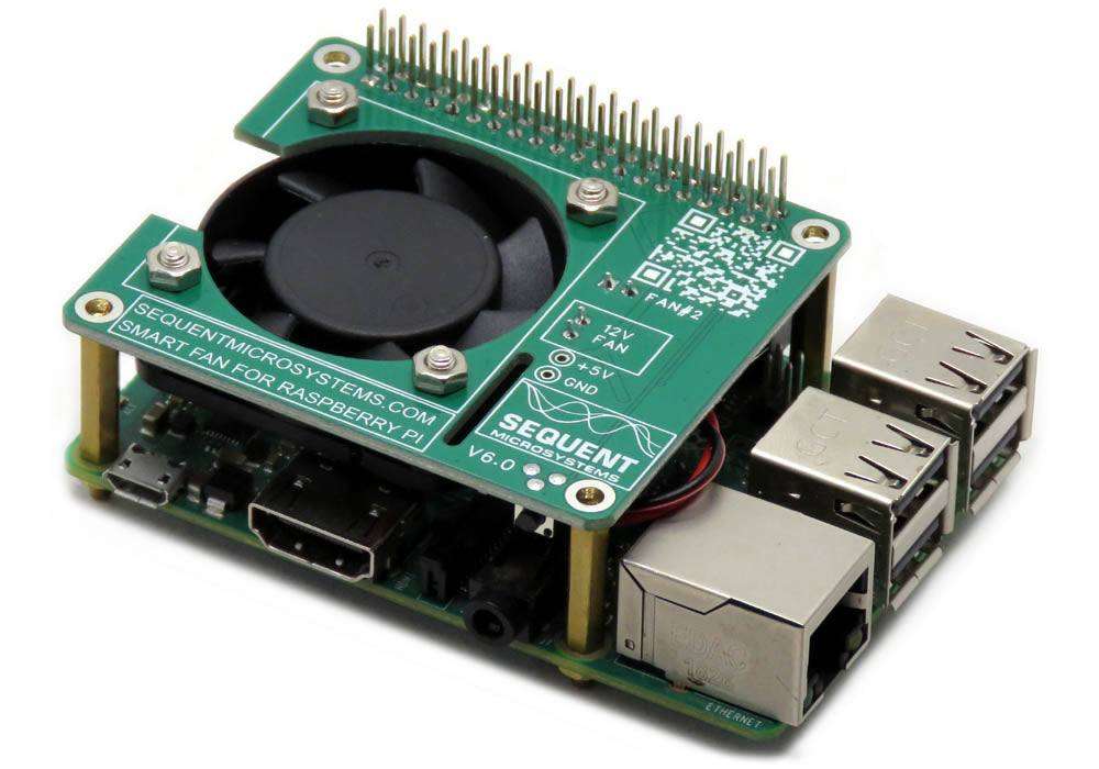Smart Fan HAT with a green circuit board and black cooling fan mounted on a Raspberry Pi, with GPIO pins and ports visible