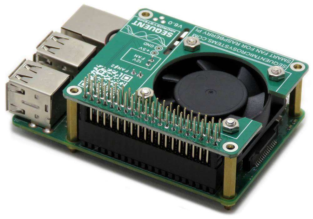 Smart Fan HAT with a green circuit board, black cooling fan, GPIO pins and brass mounting spacers