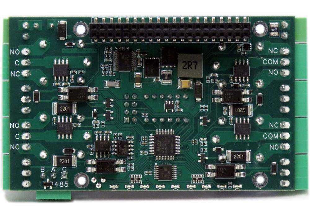 Smart Relays circuit board with a green PCB, black components, four relay channels, terminal labels and GPIO header