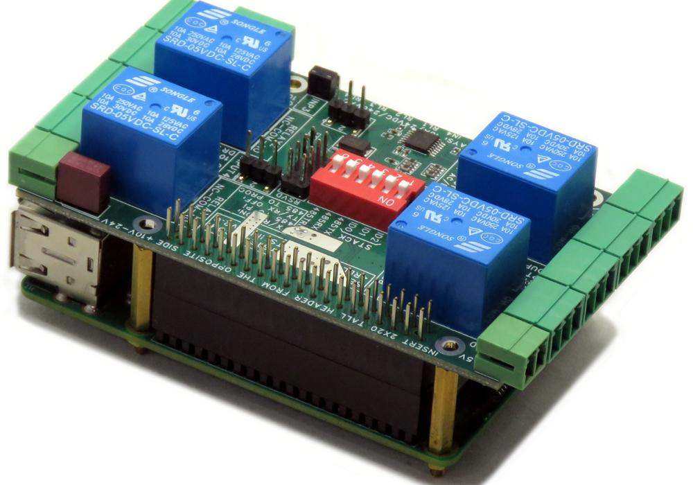 Smart Relays Raspberry Pi HAT with green circuit board, four blue relays, red DIP switch, and green terminal blocks