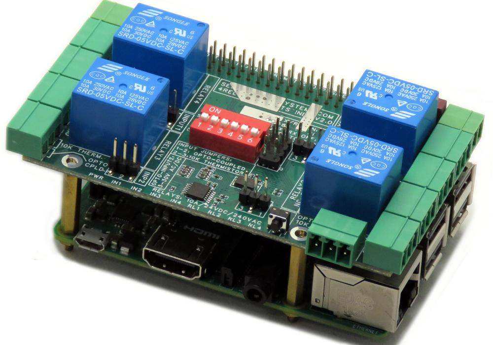 Smart Relays Raspberry Pi HAT with a green circuit board, four blue relays, green terminal blocks, and red DIP switch