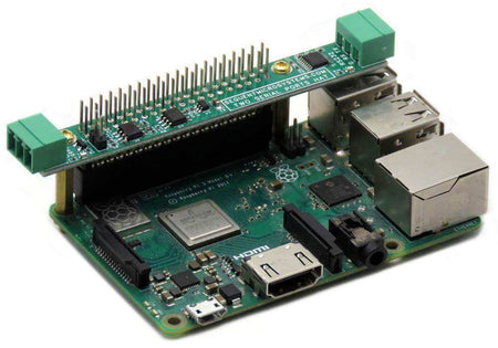 Two Serial Ports Raspberry Pi HAT with green circuit board, screw-terminal connectors and tall GPIO header stacked on a Pi