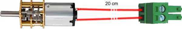 Accessories Kit micromotor with a silver cylindrical motor, brass gearbox, red wires and green screw-terminal plug