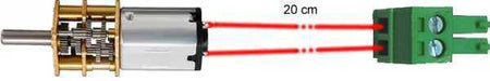Accessories Kit micromotor with a silver cylindrical motor, brass gearbox, red wires and green screw-terminal plug