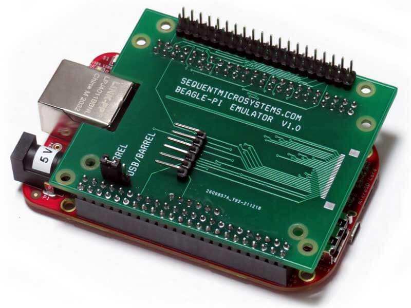 Beagle-Pi adapter board with a green circuit board, black pin headers, and mounting holes fitted over a red BeagleBone board