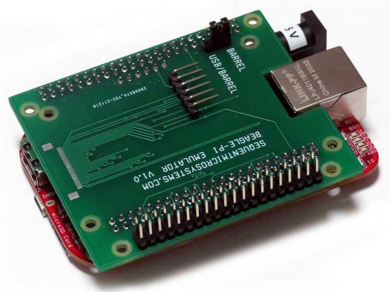 Beagle-Pi adapter board, green printed circuit board with black pin headers, mounting holes and barrel connector